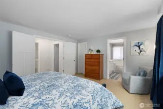 Double-door entry and large walk-in closet are featured in the primary ensuite bedroom