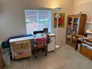 Guest bedroom which is used now as a sewing room.
