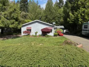 Front of home and garage in back.