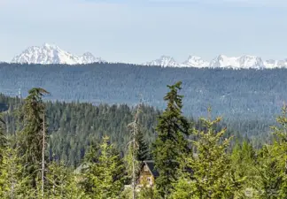 Imagine your dream home with big A-frame windows overlooking the Stuart Mountain Range. Gorgeous!