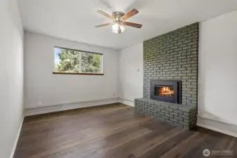 Downstairs family room with fireplace