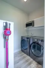 Utility room with shelving and plenty of room for storage