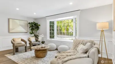 Living room with a built in bench.