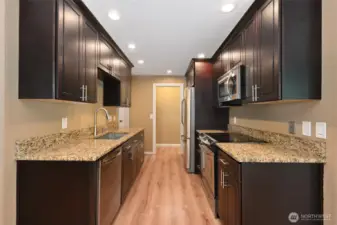 Updated kitchen with Stainless Steel appliances, granite countertops
