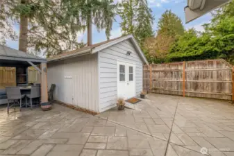 OUTDOOR LIVING | We love the stamped concrete patio. This is the view when you step out the back door through the laundry room.