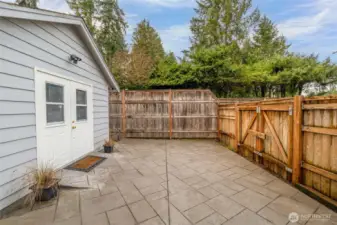 OUTDOOR LIVING | Freshly pressure-washed and ready to enjoy. You'll notice the double gate that allows great access to the shop where you can safely store belongings.