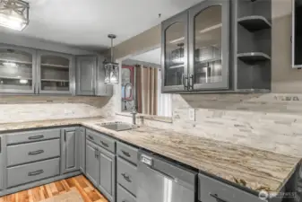 MAIN FLOOR | Another angle of the kitchen with the pass-through to the dining room.