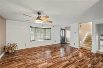 WELCOME | Here's a great look at the living room as you enter through the front door.