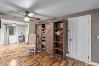 MAIN FLOOR PANTRY AREA | Yes, the beautiful and functional cabinet stays with the home.