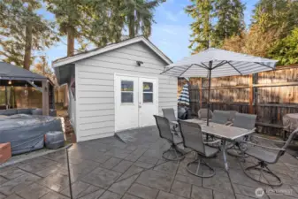 BACKYARD | The tall privacy fence makes this backyard a delight. Combine it with the huge patio with multiple areas for outdoor living and you'll spend a lot of time out here.