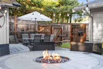 BACKYARD | Looking back towards the gates that lead to the side yard and driveway.