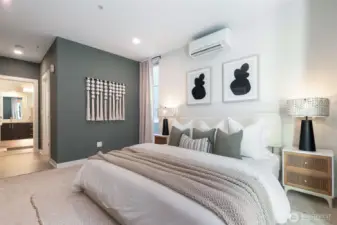 A refreshed primary suite with soothing sage tones designed for slow mornings and easy nights.