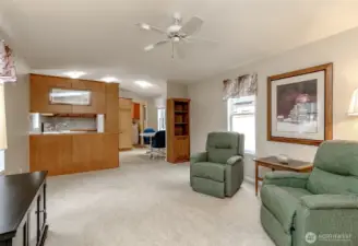 Living area is situated just off the kitchen with dining space.