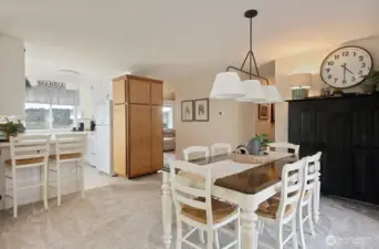 the dining area, kitchen and  (not shown but to the left)  family room area.