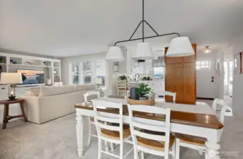 Next to the kitchen and dining area is the family room