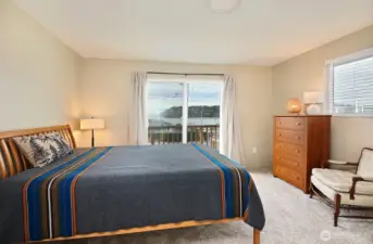 The primary bedroom also has westerly views and