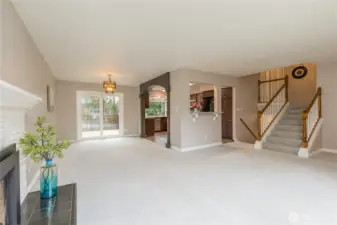 Living room flows to the dining room and spacious kitchen.