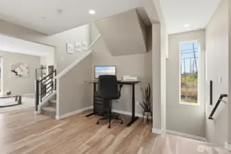 Use this nook as a WFH space, a seating area, or a plant corner.