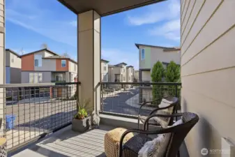 This balcony is the ideal spot to sip morning coffee or relax with a good book.
