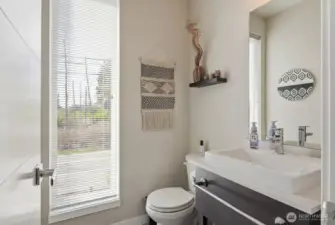 Handy half bath on the main level.