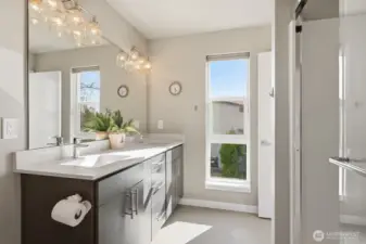 The primary ensuite bath will make getting ready each day feel like a trip to the spa.