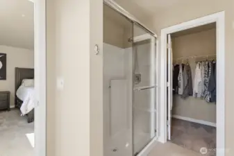 A walk-in closet ensures that all your favorite pieces always have their place.