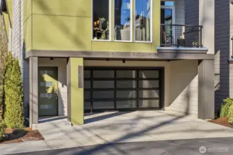 The extra-deep 2-car garage can easily accommodate two SUVs with extra space for storage as well.