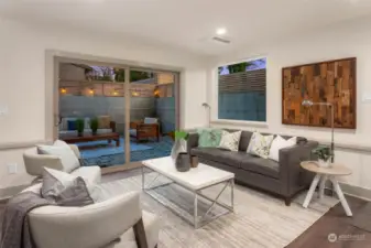 ADU- generous living room with sliders to private back patio