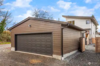 Oversized two car garage off alley PLUS tons of street parking on the large corner lot!