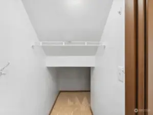 Check out the huge closet under the stairs.