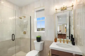Full bath located on main floor living level - features gorgeous full tile walls!