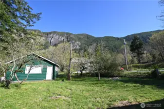 4 CITY LOTS ~ Expansive (fully fenced yard) to host gatherings. Extra Parking on Crescent and Ave A.