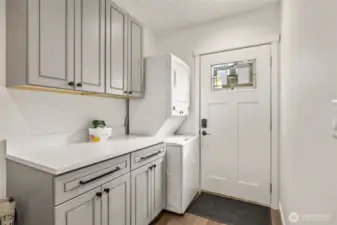 Laundry room with side door