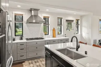Quartz and tile kitchen.