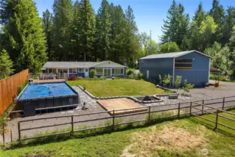 Add a pool or greenhouse on the gravel pad, Deck can be used for dining or relaxing in the evening sun!
