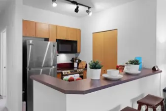 Kitchen with newer appliances.