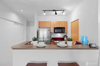 Kitchen with newer appliances.