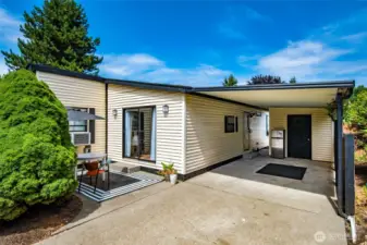 Carport provides protection from the elements and the shed gives you room to store/organize your extra belongings.