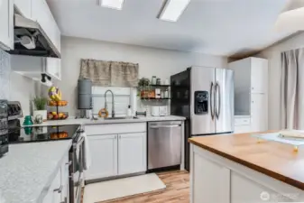 Enjoy NEW Shaker cabinets and NEW countertops!
