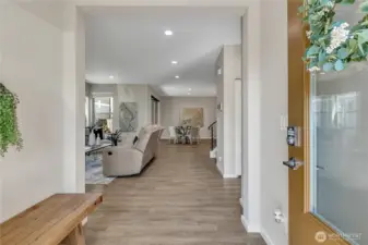LVP floors welcome you as you enter.