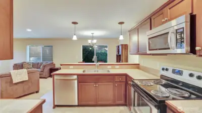 All the appliances are stainless steel.  There is a eating bar attached to the kitchen counter.