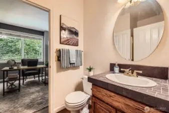 3/4 bath on the main level adjacent to den