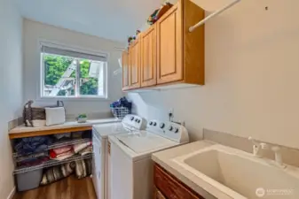 Laundry room with convenient sink.