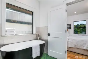 With separate soaking tub.