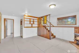 Den or rec room with it's own wood fireplace