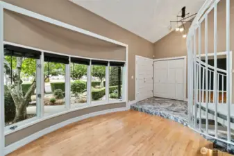 This is the entry with a wonderful bay of beautiful windows.