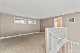 Now we are upstairs in the loft area.  There are two bedrooms, one on each side of the loft.