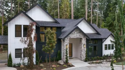 Nestled on 2.5 serene acres just minutes from Microsoft, this custom-built Redmond estate redefines Pacific Northwest living.