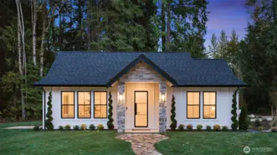 Thoughtfully designed for versatility and luxury, the property showcases a separate cottage with its own garage -ideal for multi-generational living, guests, or income potential.