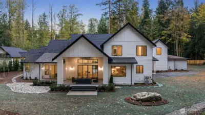 A thoughtfully designed, covered and heated outdoor terrace provides comfort and connection year-round.